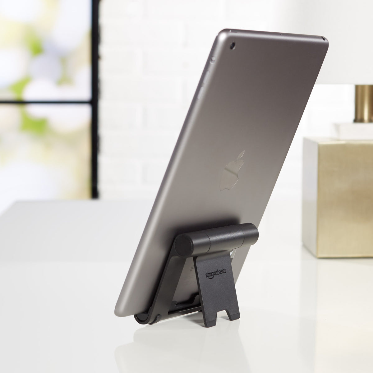 Amazon Basics Multi-Angle Portable Foldable Stand for iPad Tablet, E-reader and Phone, Sturdy Hands-Free Viewing, Black